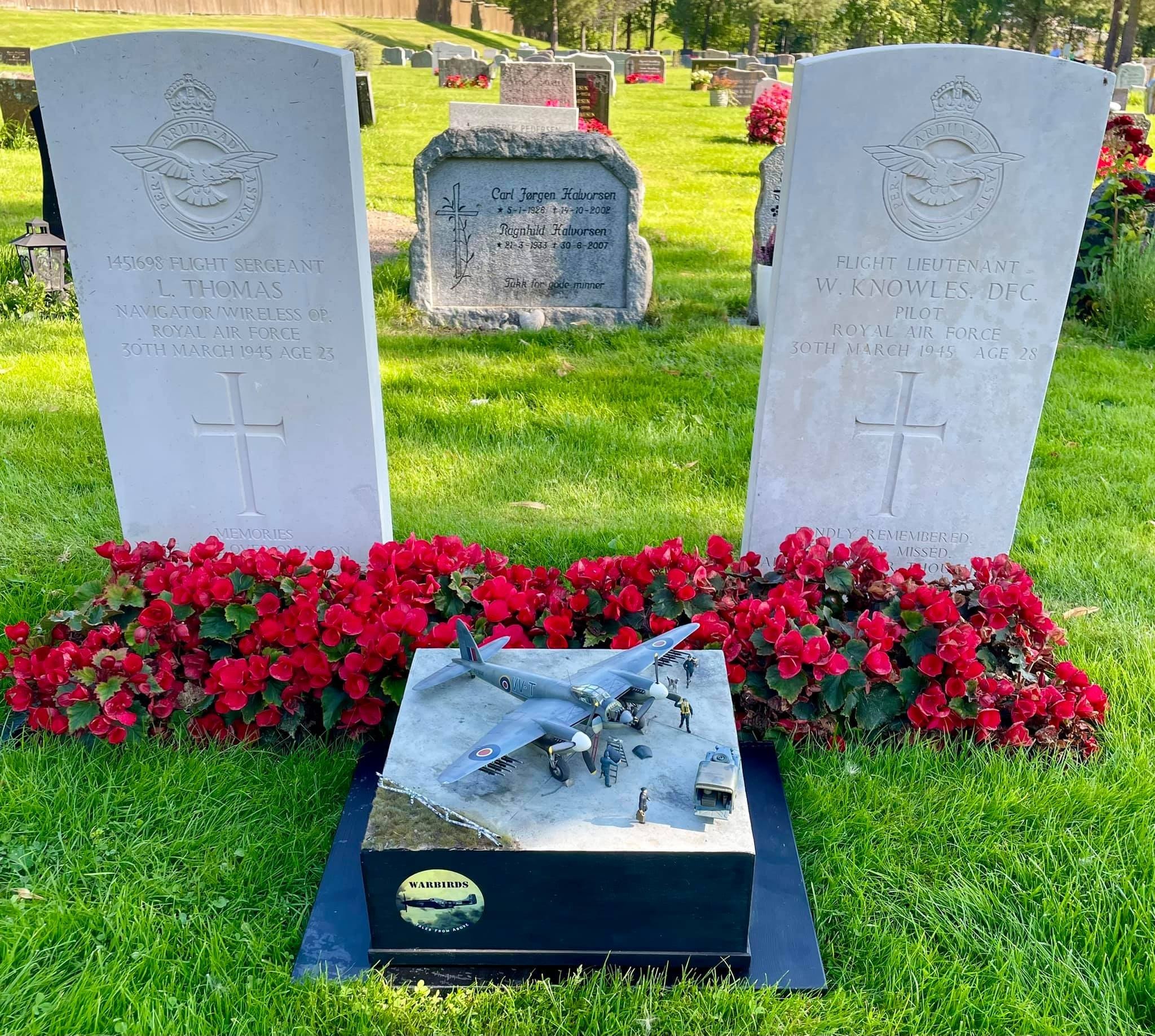 This photo touched my heart when I saw it, taking his model of the only Mossie that did not make it back was taken to the two pilots buried next to one another in Skein