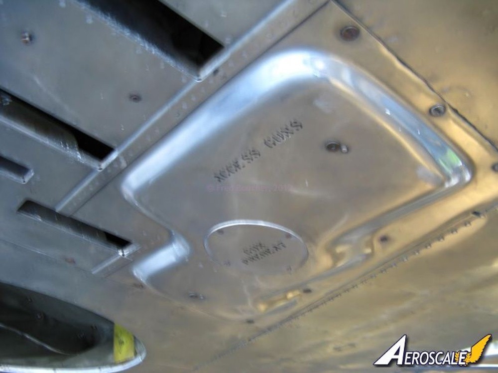 Blurry (sorry) -says "ACCESS GUNS" and something in Klingon
